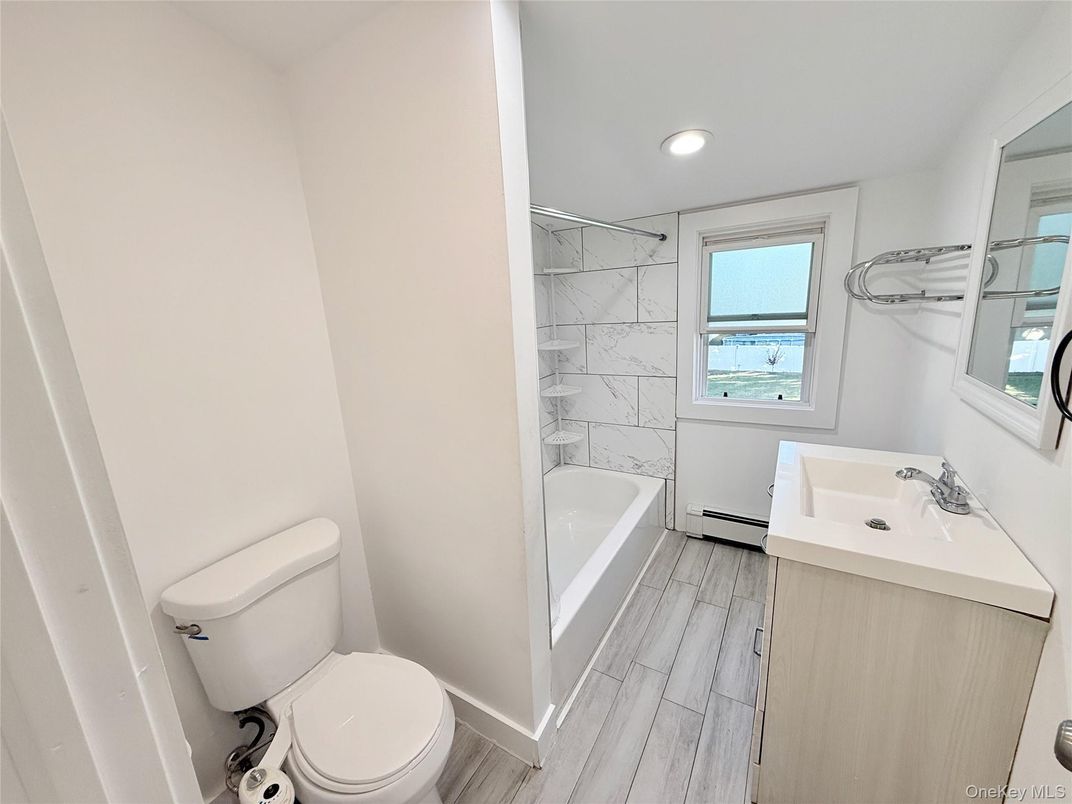 Bathroom, Interior, Marble Walls, Recessed Lighting, Wood Texture Flooring