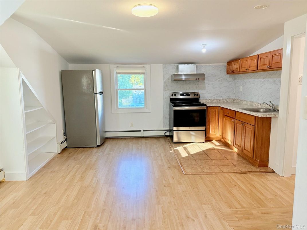 Interior, Kitchen, Marble Walls, Stainless Steel Appliances, Wood Texture Flooring