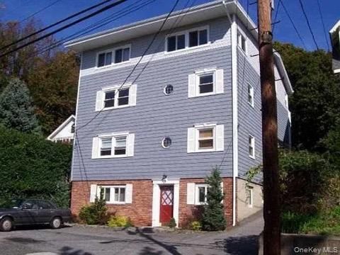 Exterior, Facade, Brick Facade, American Foursquare