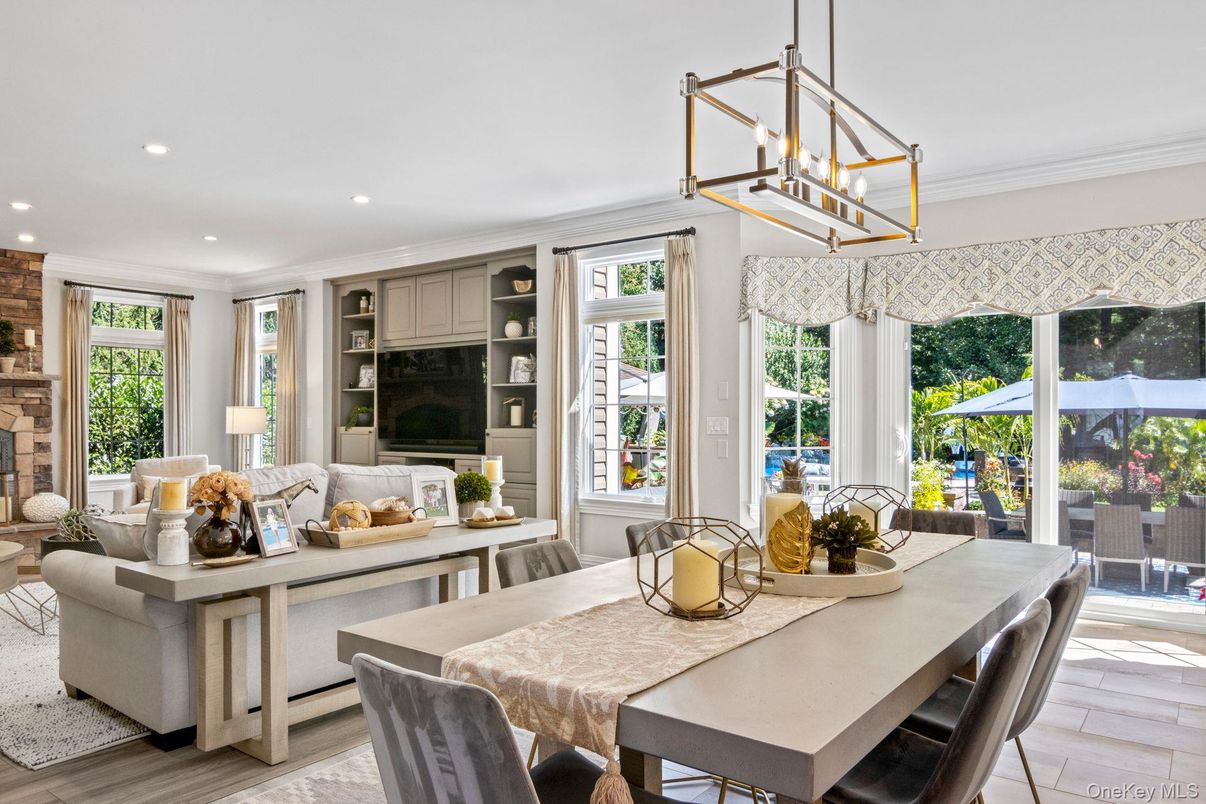 Dining room, Fireplace, Interior, Living room, Pendant Lights, Recessed Lighting, Wood Texture Flooring