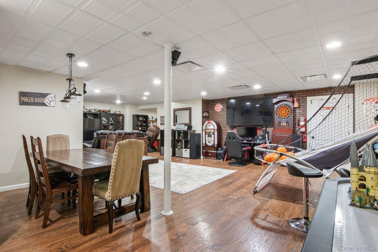 Dining room, Fireplace, Interior, Pendant Lights, Recessed Lighting, Stone Walls, Wood Texture Flooring
