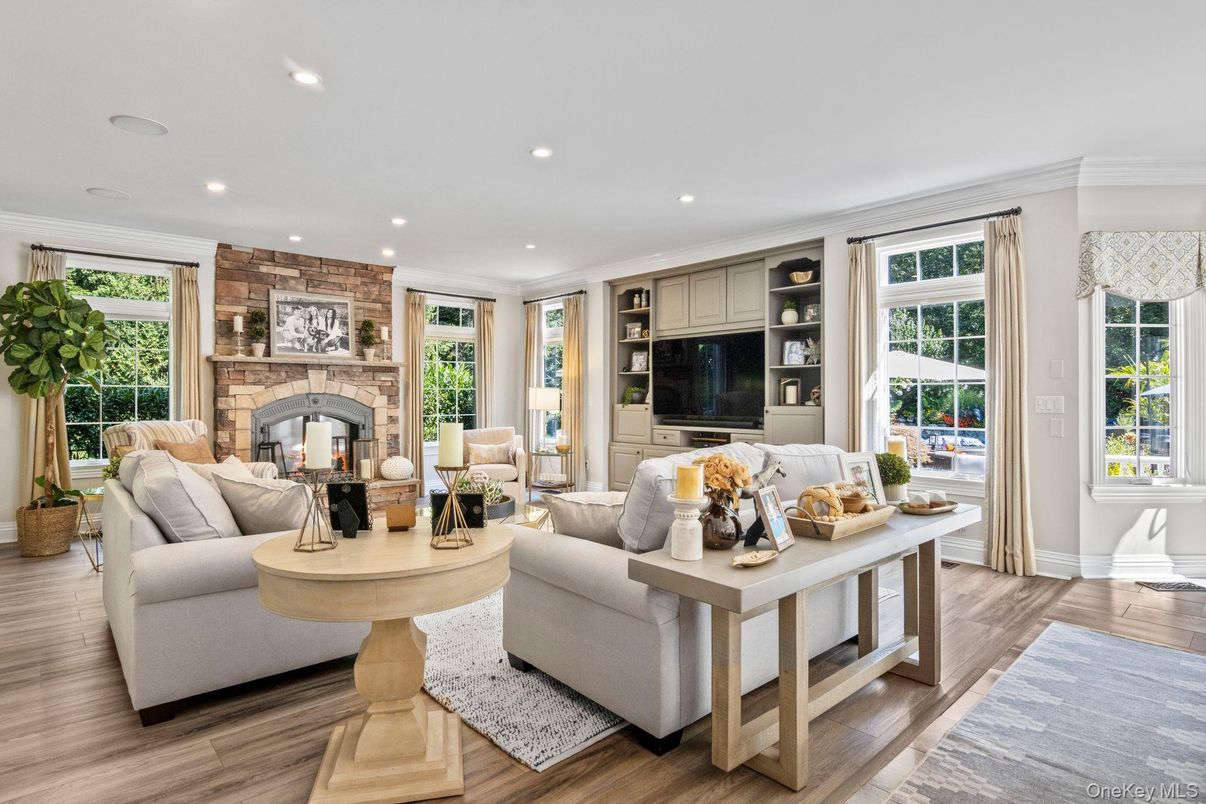 Fireplace, Interior, Living room, Recessed Lighting, Stone Walls, Wood Texture Flooring