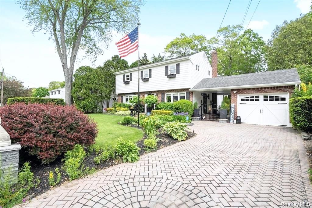Attached, Backyard, Exterior, Facade, Brick Facade, Cape Cod