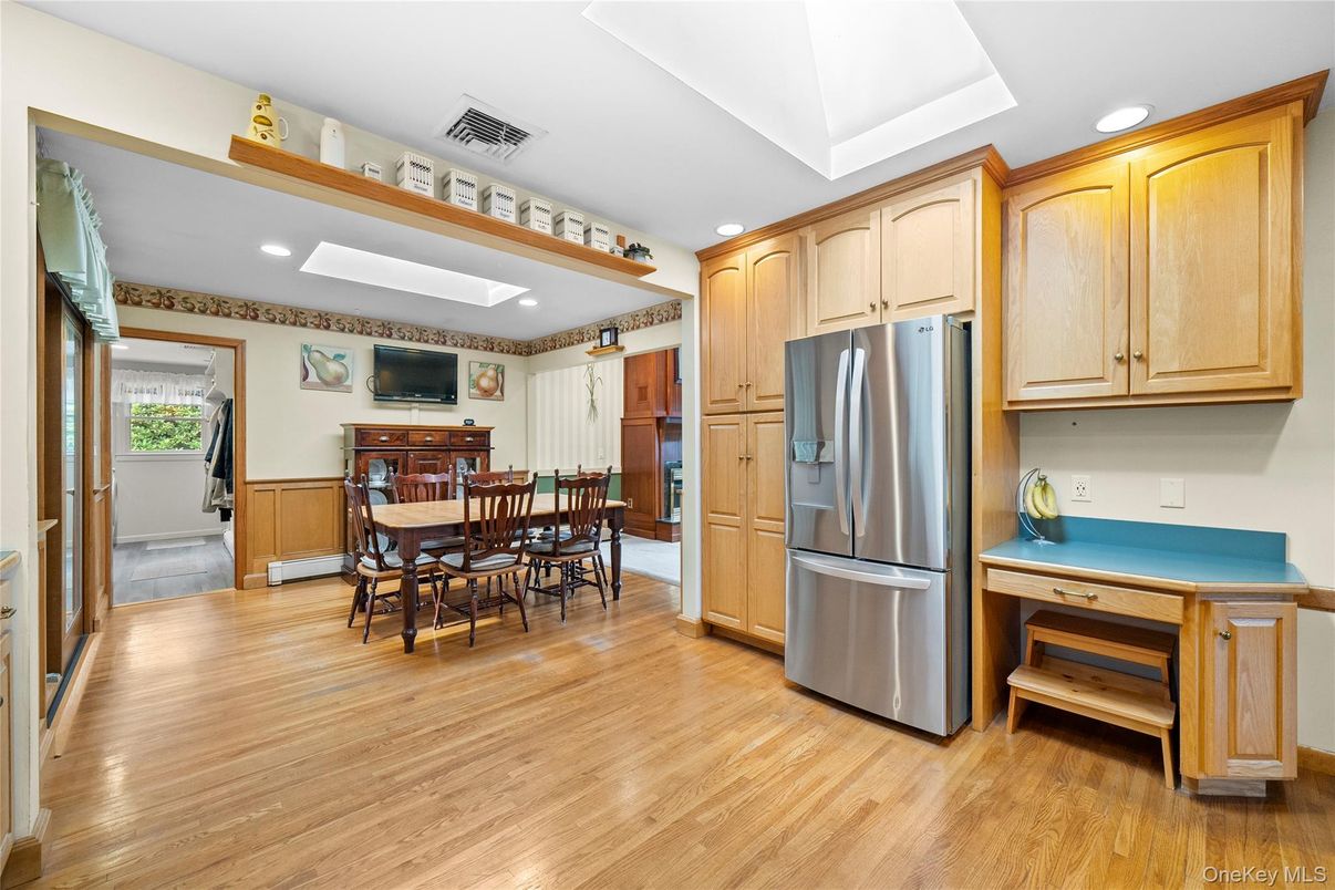 Dining room, Interior, Kitchen, Recessed Lighting, Stainless Steel Appliances, Wood Texture Flooring