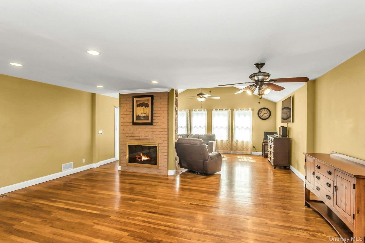 Fireplace, Interior, Living room, Recessed Lighting, Wood Texture Flooring