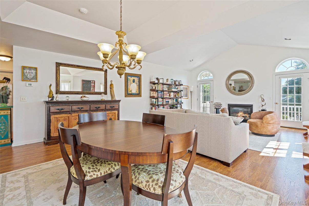 Chandelier, Dining room, Fireplace, Interior, Living room, Recessed Lighting, Wood Texture Flooring
