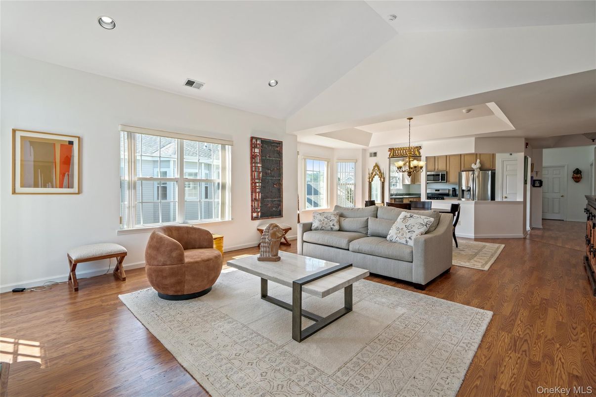 Chandelier, Interior, Kitchen, Living room, Recessed Lighting, Stainless Steel Appliances, Wood Texture Flooring