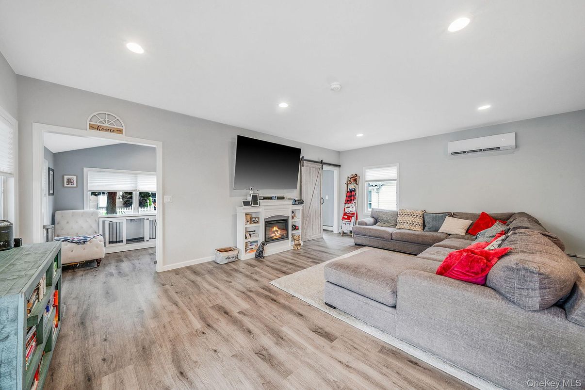 Fireplace, Interior, Living room, Recessed Lighting, Wood Texture Flooring