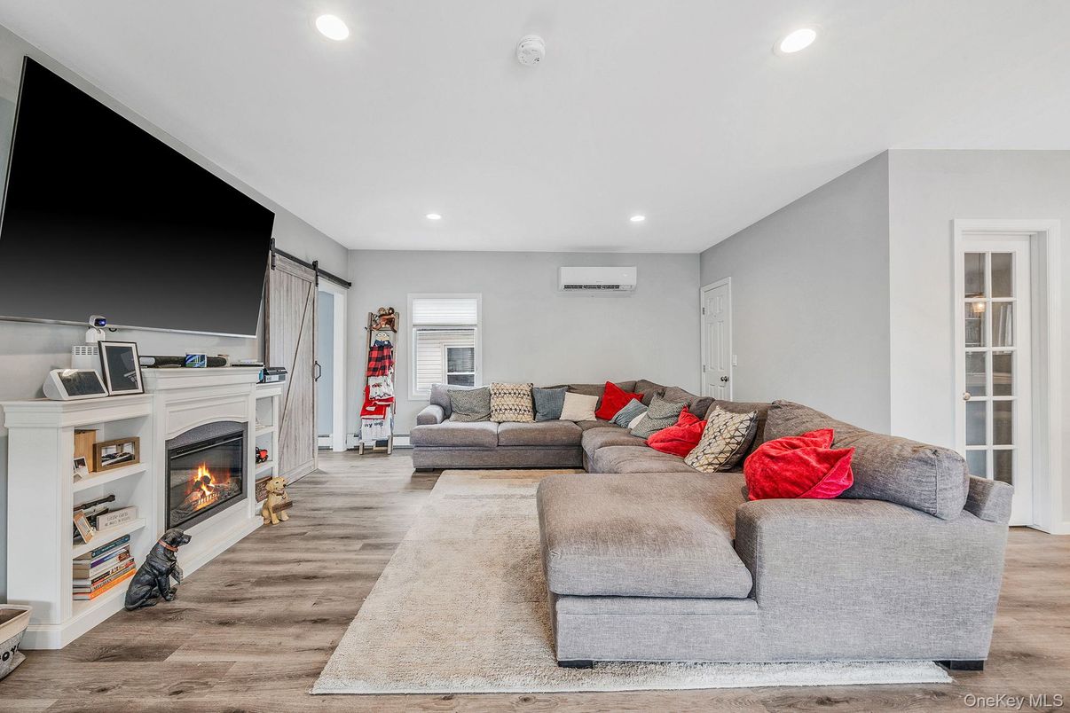Fireplace, Interior, Living room, Recessed Lighting, Wood Texture Flooring