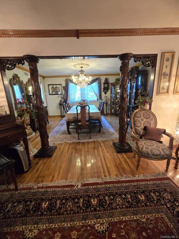 Chandelier, Dining room, Interior, Piano, Wood Texture Flooring