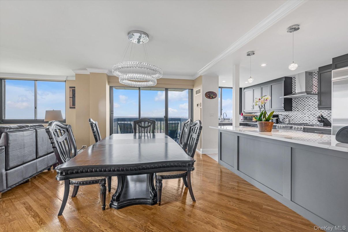 Dining room, Interior, Kitchen, Pendant Lights, Recessed Lighting, Stainless Steel Appliances, Wood Texture Flooring