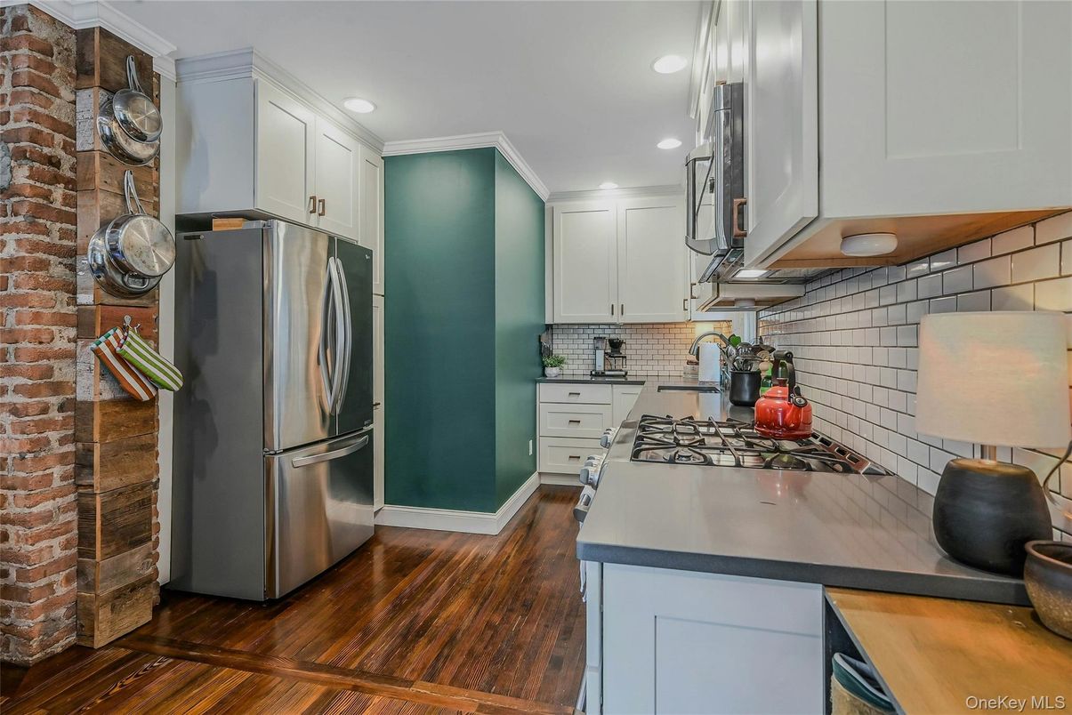 Interior, Kitchen, Recessed Lighting, Stainless Steel Appliances, Stone Walls, Wood Texture Flooring