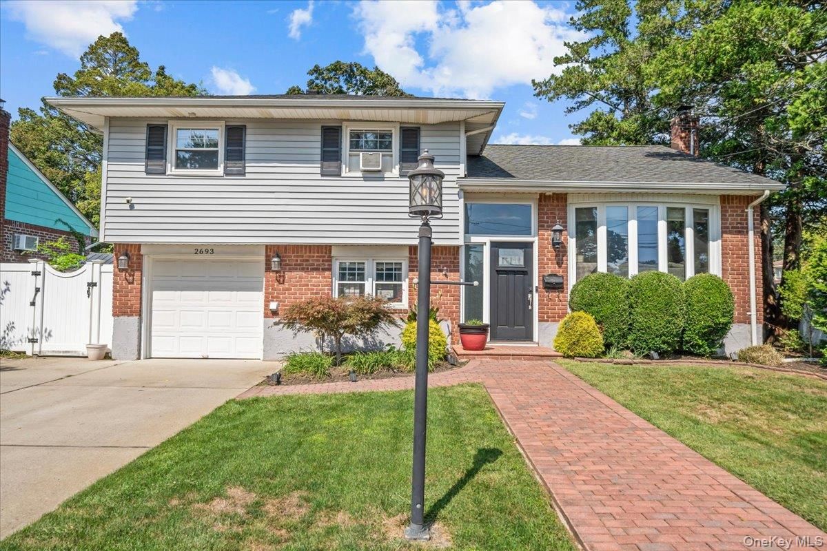 Attached, Exterior, Facade, Brick Facade, Split Level