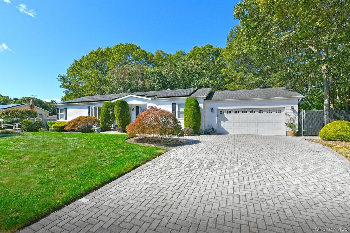 Attached, Exterior, Facade, Brick Facade, Solar Panels, Ranch