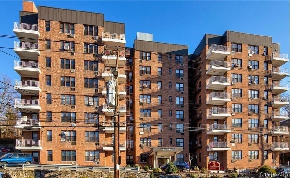 Exterior, Facade, Brick Facade, Condo Building