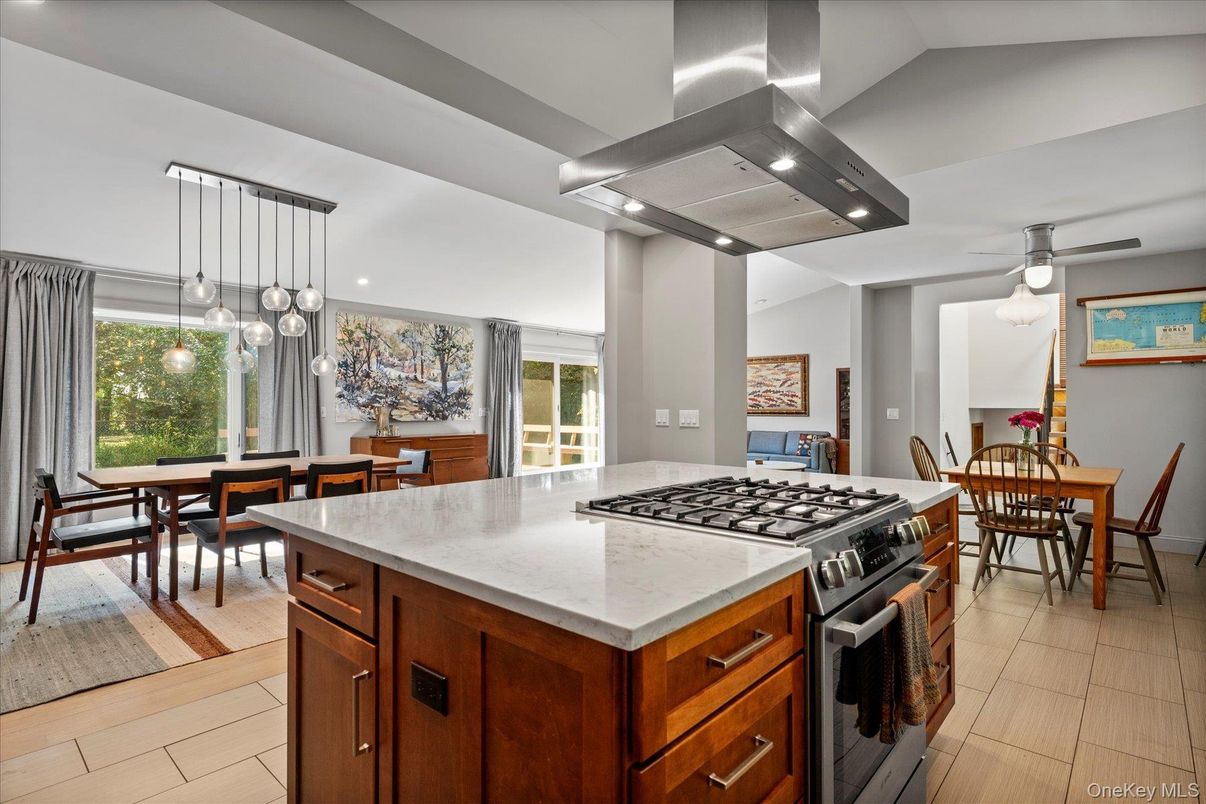 Dining room, Interior, Kitchen, Pendant Lights, Recessed Lighting, Stainless Steel Appliances, Wood Texture Flooring