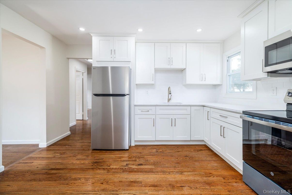 Interior, Kitchen, Recessed Lighting, Stainless Steel Appliances, Wood Texture Flooring