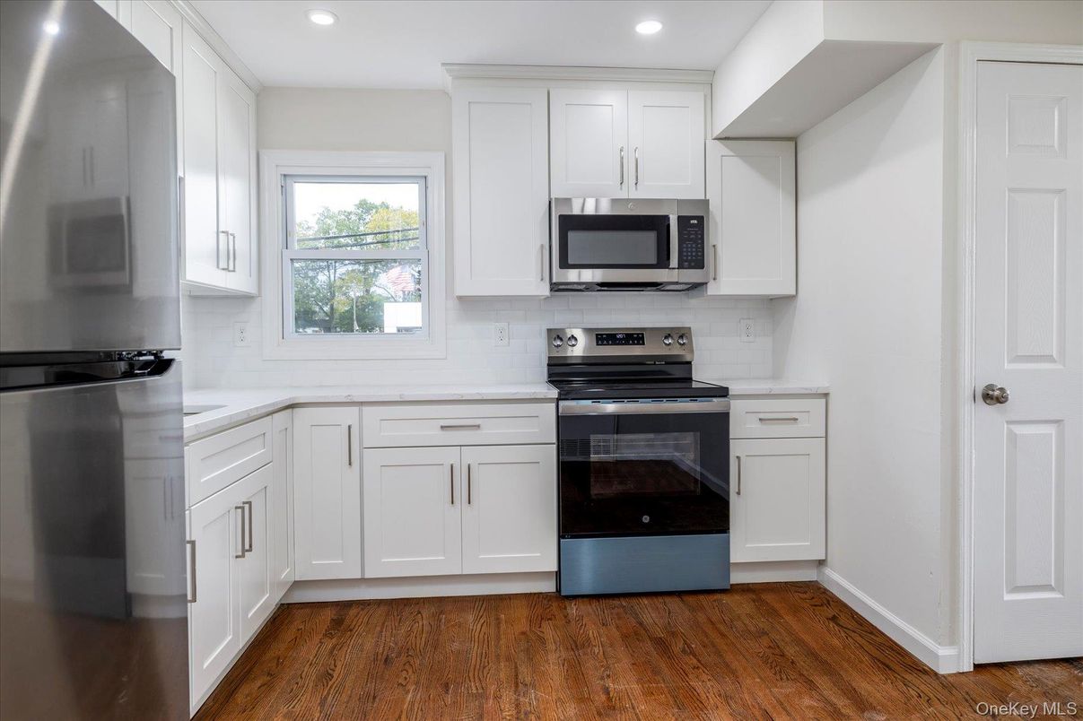 Interior, Kitchen, Recessed Lighting, Stainless Steel Appliances, Wood Texture Flooring