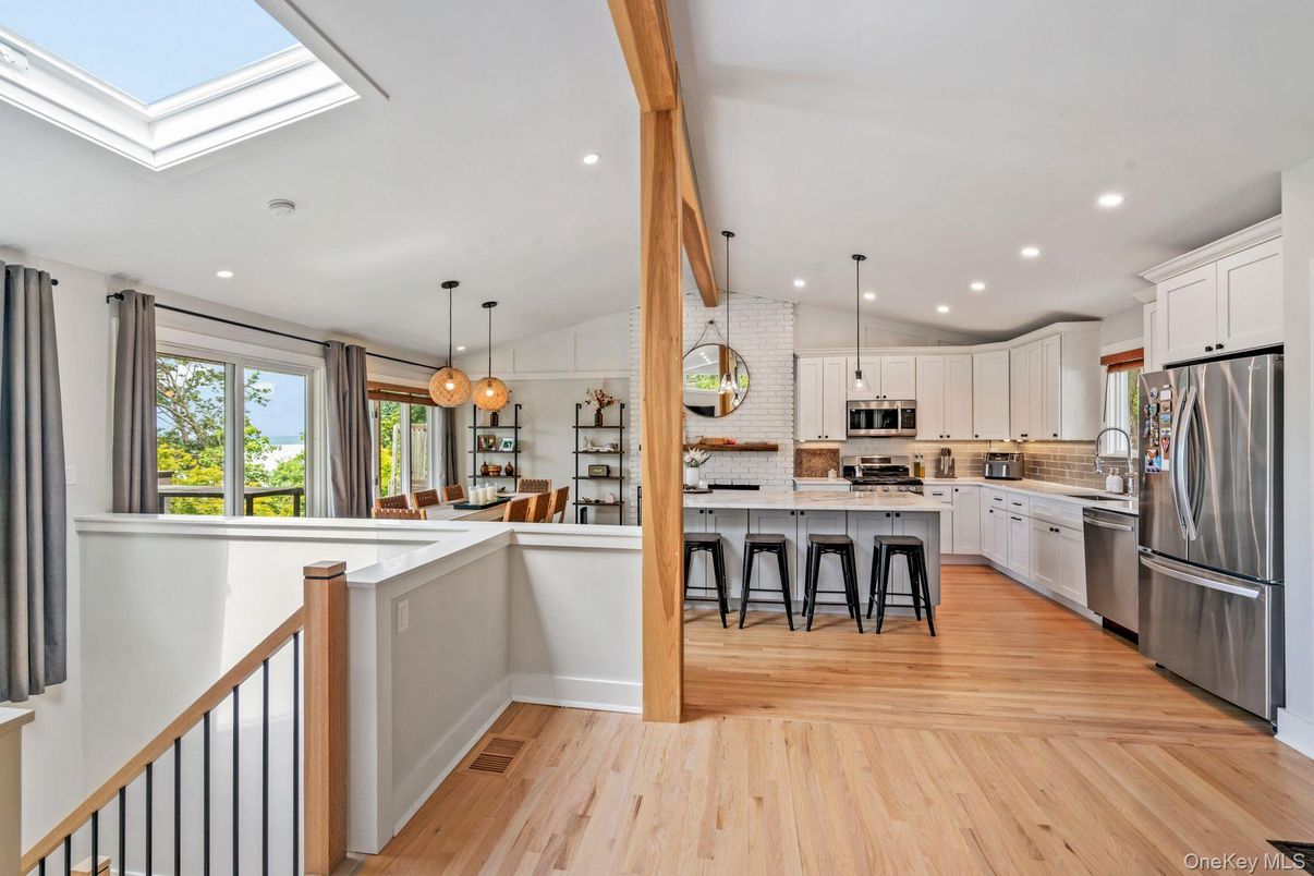 Interior, Kitchen, Pendant Lights, Recessed Lighting, Stainless Steel Appliances, Stone Walls, Wooden Beams, Wood Texture Flooring