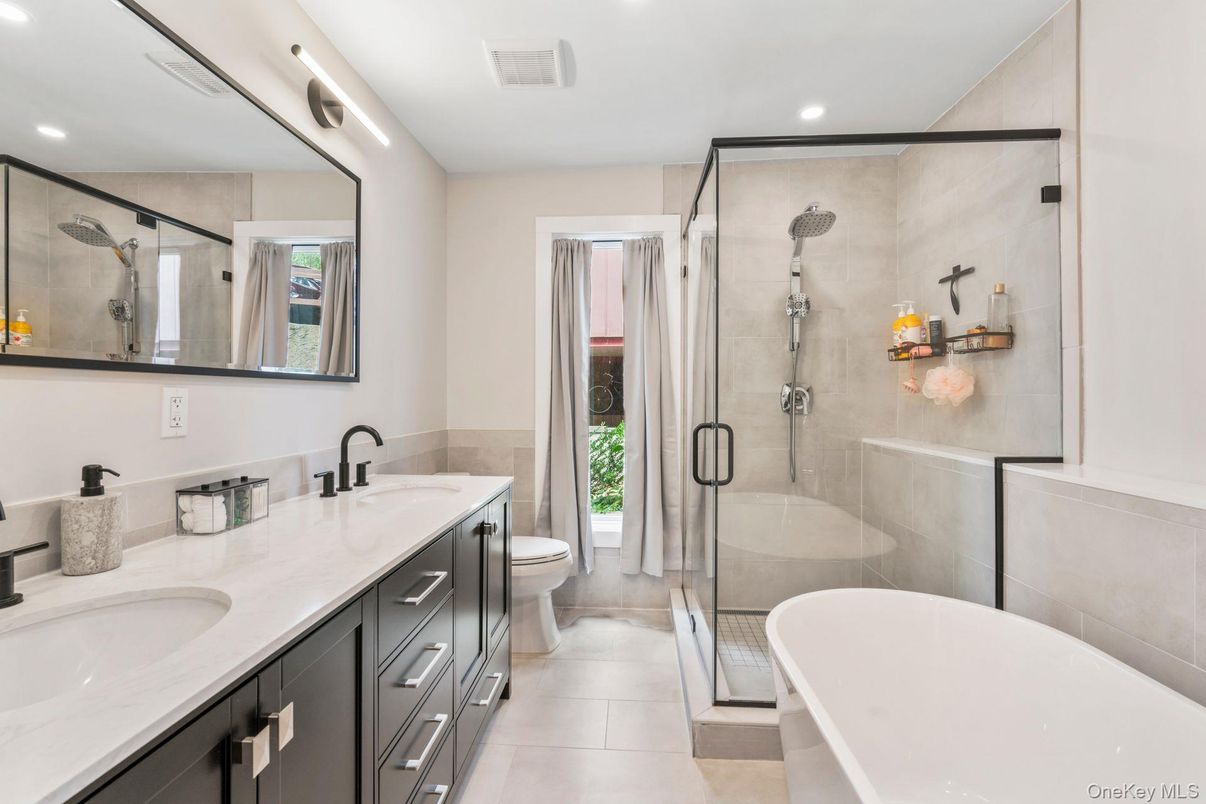 Bathroom, Dual Sink Vanities, Free Standing Baths, Glass Shower, Interior, Recessed Lighting