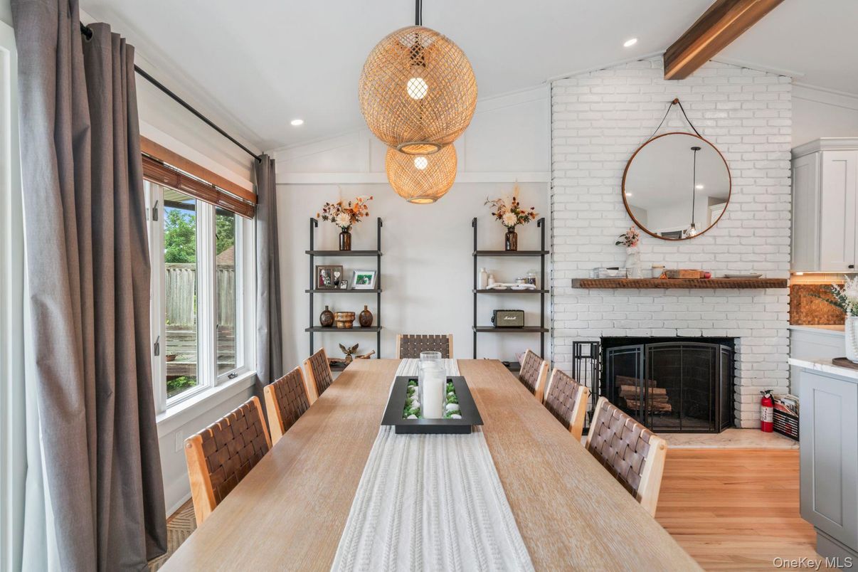 Dining room, Fireplace, Interior, Pendant Lights, Recessed Lighting, Stone Walls, Wood Texture Flooring