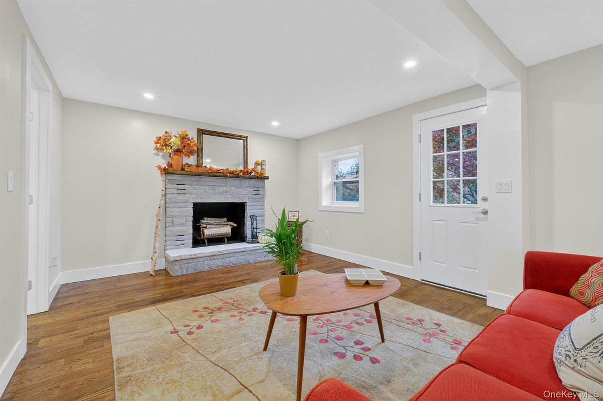 Fireplace, Interior, Living room, Recessed Lighting, Wood Texture Flooring