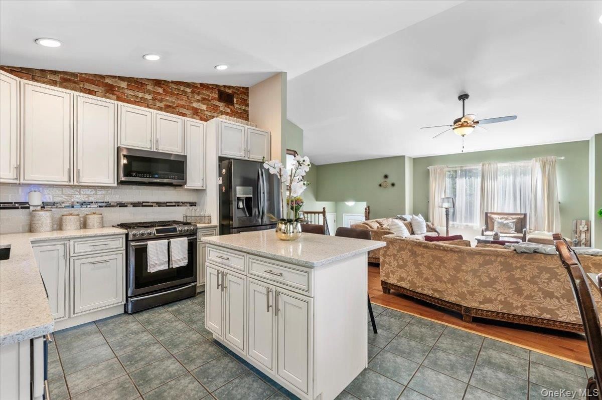 Interior, Kitchen, Living room, Recessed Lighting, Stainless Steel Appliances, Stone Walls