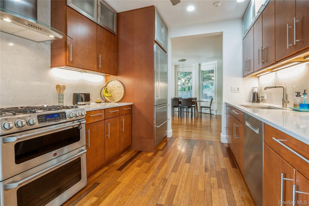 Dining room, Interior, Kitchen, Recessed Lighting, Stainless Steel Appliances, Wood Texture Flooring