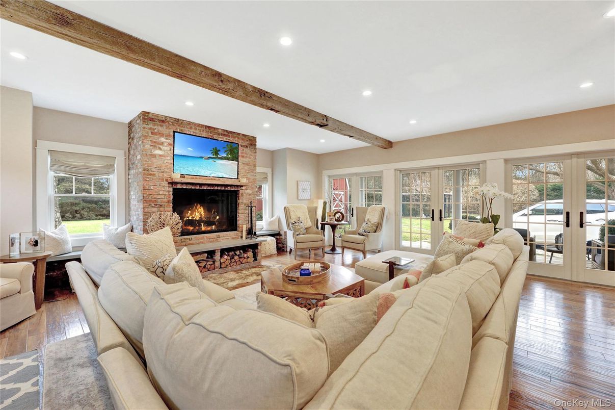 Fireplace, Interior, Living room, Recessed Lighting, Stone Walls, Wooden Beams, Wood Texture Flooring