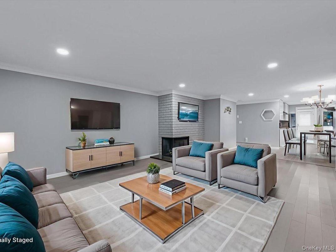 Dining room, Fireplace, Interior, Living room, Pendant Lights, Recessed Lighting, Stone Walls, Wood Texture Flooring