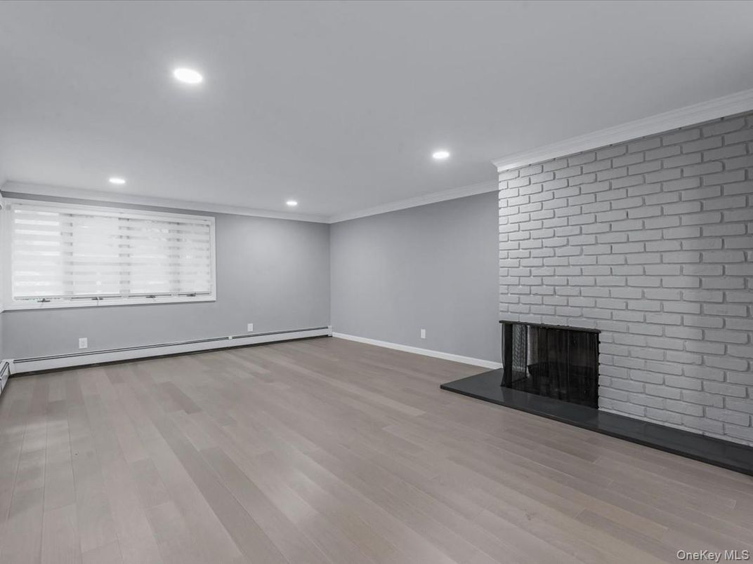 Empty room, Fireplace, Interior, Recessed Lighting, Wood Texture Flooring