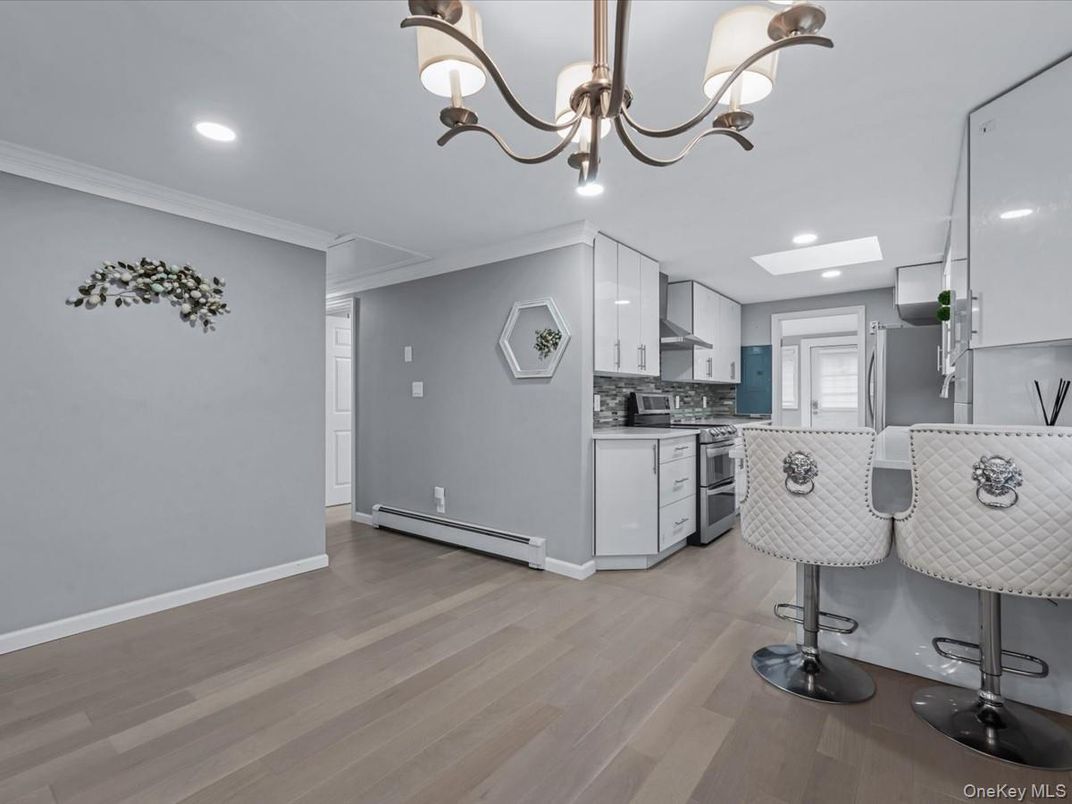 Chandelier, Interior, Kitchen, Recessed Lighting, Stainless Steel Appliances, Wood Texture Flooring