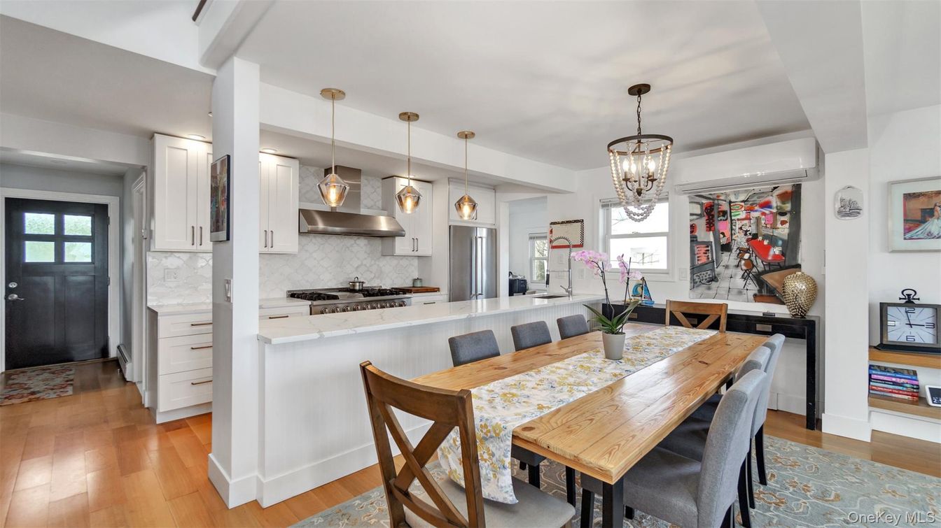 Chandelier, Dining room, Interior, Kitchen, Pendant Lights, Stainless Steel Appliances, Wood Texture Flooring