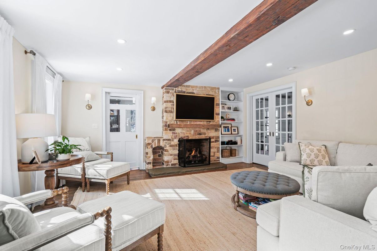 Fireplace, Interior, Living room, Recessed Lighting, Stone Walls, Wooden Beams, Wood Texture Flooring