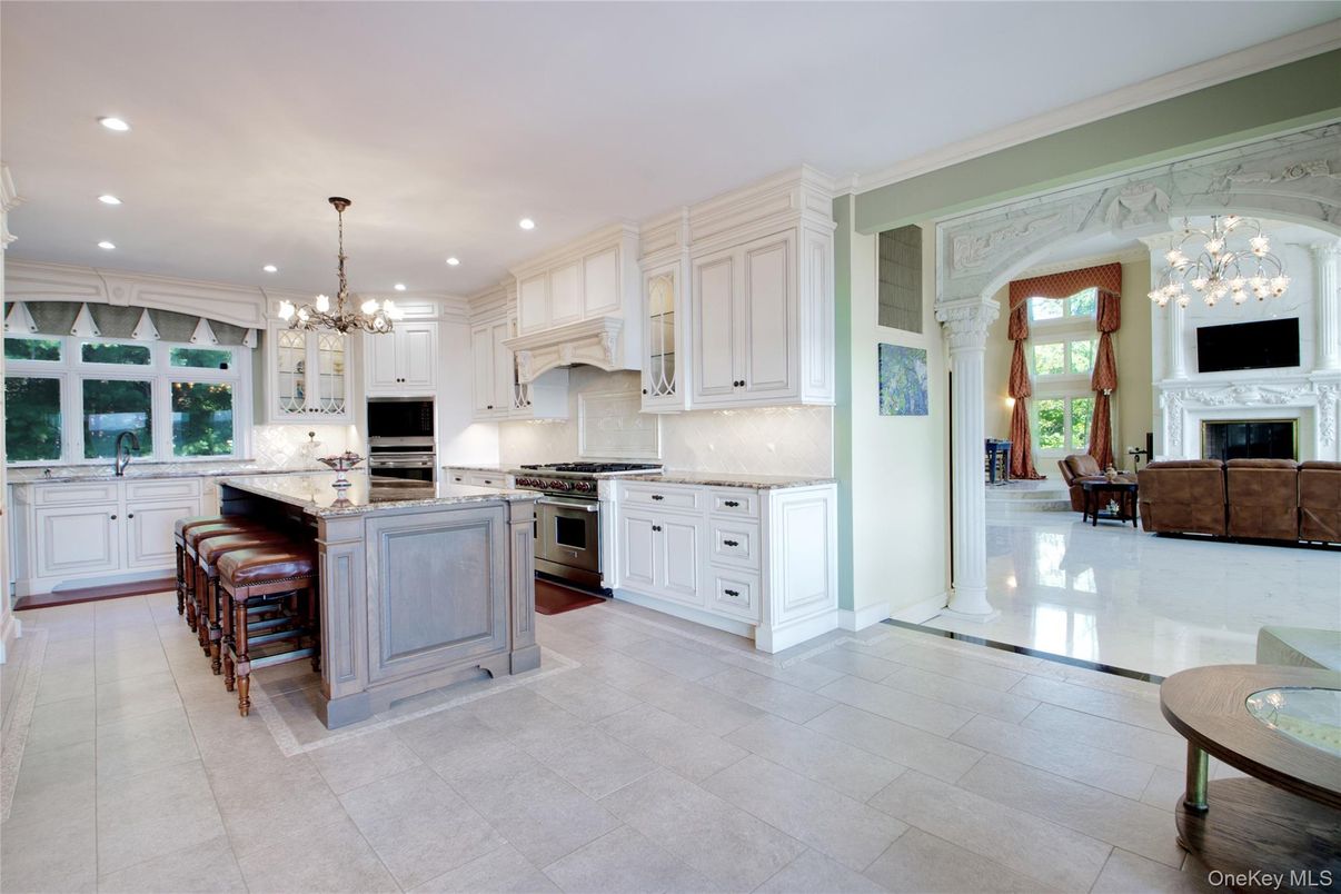 Chandelier, Fireplace, Interior, Kitchen, Pendant Lights, Recessed Lighting, Stainless Steel Appliances