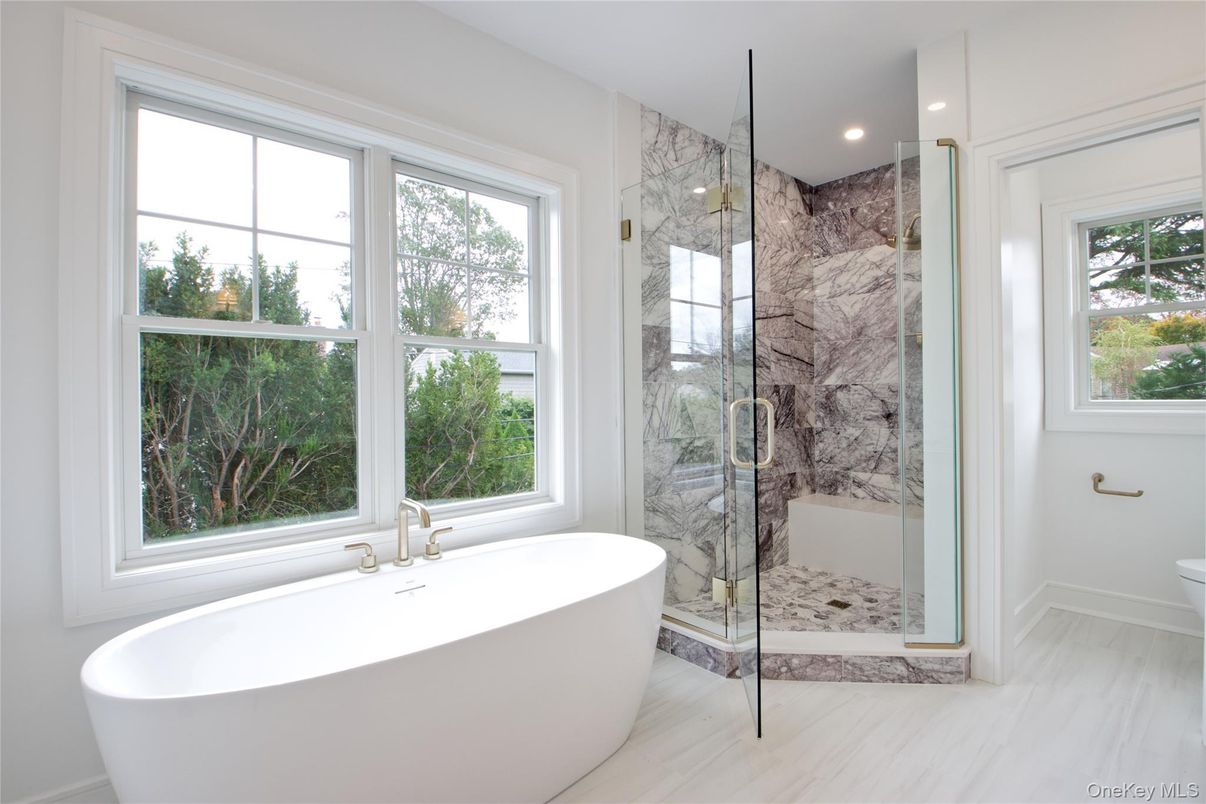 Bathroom, Free Standing Baths, Glass Shower, Interior, Marble, Marble Walls, Recessed Lighting
