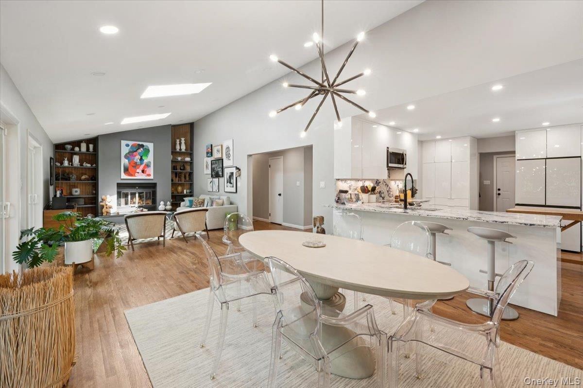 Dining room, Fireplace, Interior, Kitchen, Living room, Pendant Lights, Recessed Lighting, Wood Texture Flooring