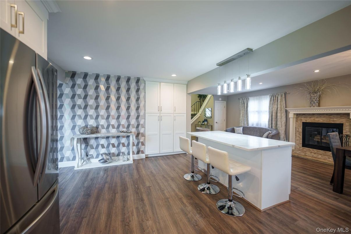 Fireplace, Interior, Pendant Lights, Recessed Lighting, Wood Texture Flooring