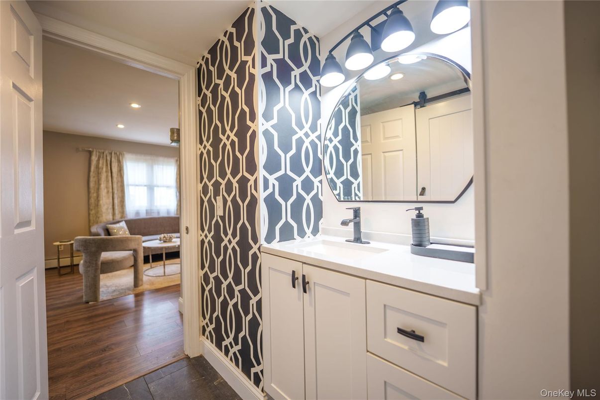 Bathroom, Dual Sink Vanities, Interior, Recessed Lighting, Wood Texture Flooring