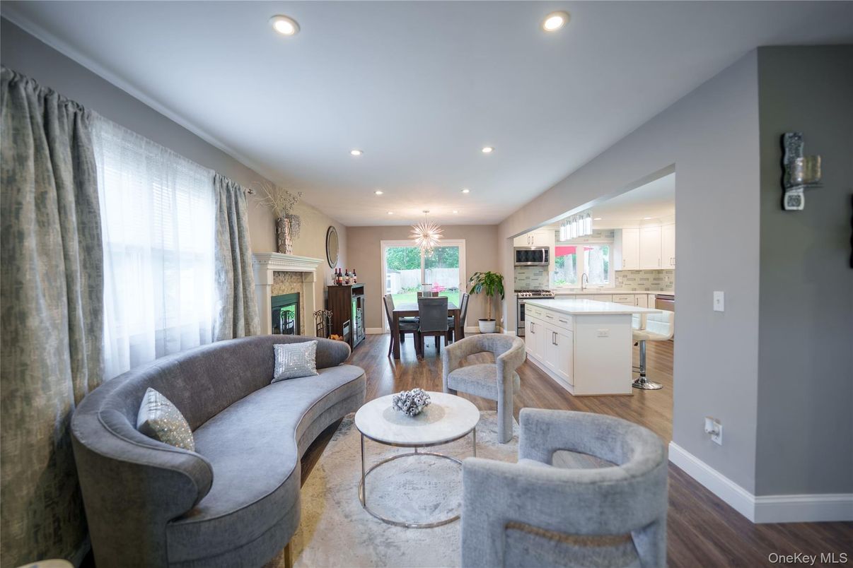Chandelier, Dining room, Fireplace, Interior, Kitchen, Living room, Recessed Lighting, Wood Texture Flooring