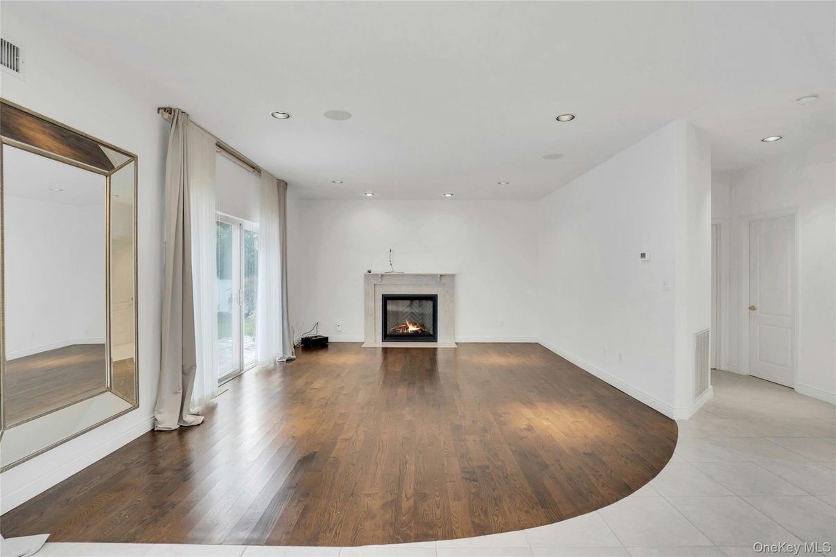 Empty room, Fireplace, Interior, Recessed Lighting, Wood Texture Flooring