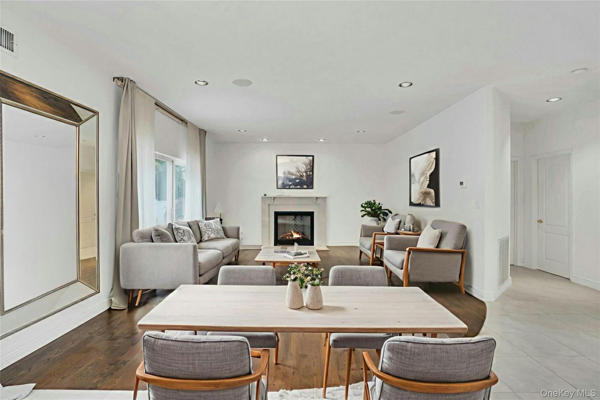 Dining room, Fireplace, Interior, Living room, Recessed Lighting, Wood Texture Flooring