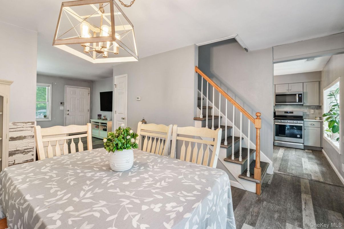 Dining room, Interior, Kitchen, Pendant Lights, Stainless Steel Appliances, Wood Texture Flooring