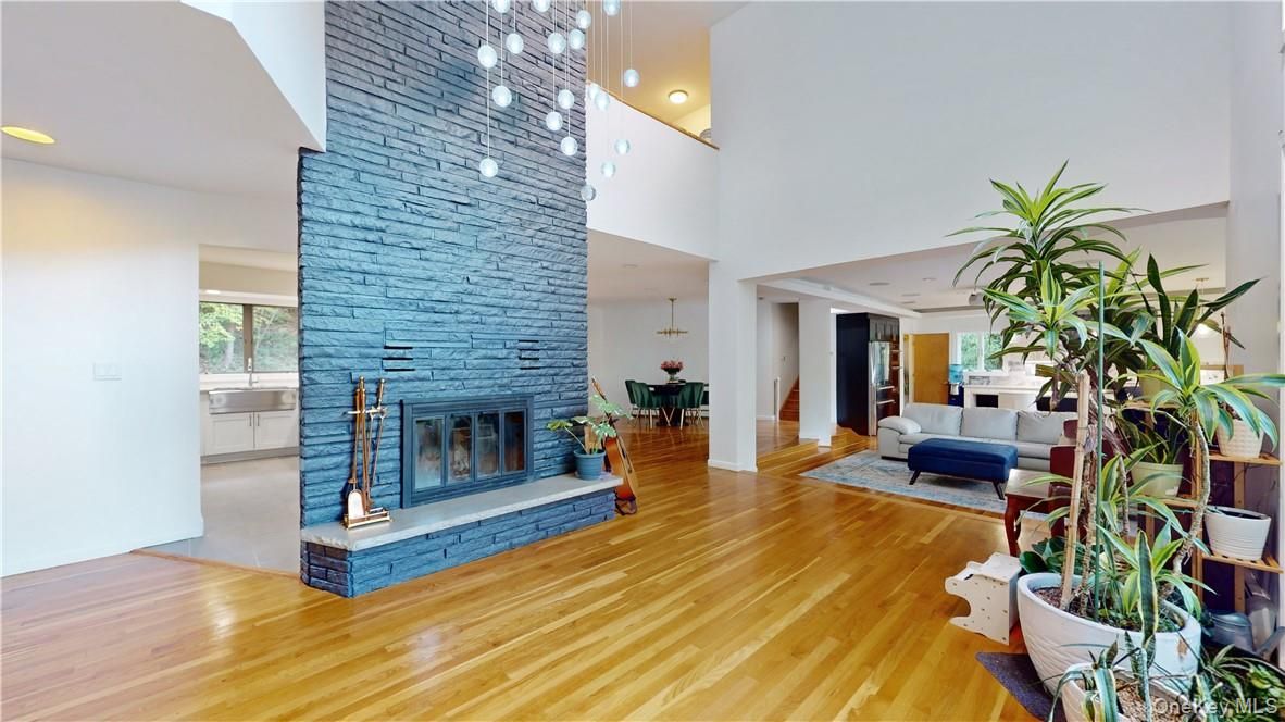 Fireplace, Interior, Pendant Lights, Recessed Lighting, Stone Walls, Wood Texture Flooring