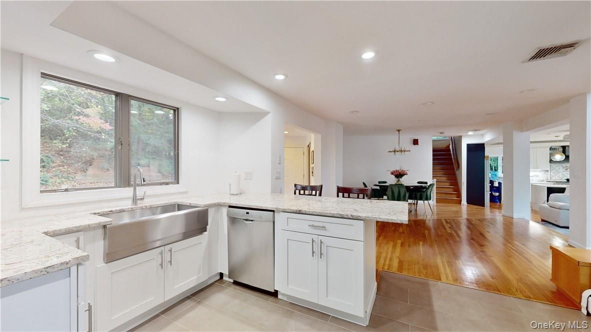 Dining room, Interior, Kitchen, Recessed Lighting, Stainless Steel Appliances, Wood Texture Flooring