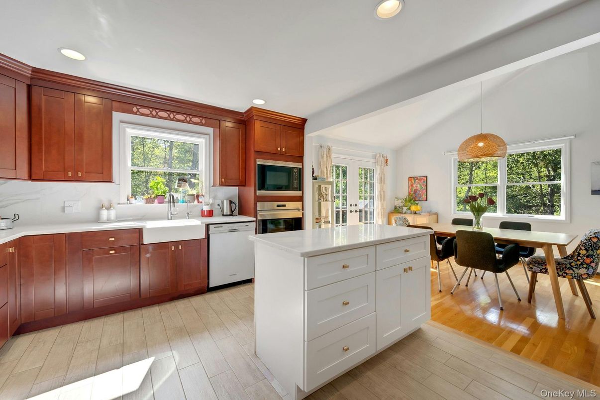 Dining room, Interior, Kitchen, Pendant Lights, Recessed Lighting, Stainless Steel Appliances, Wood Texture Flooring