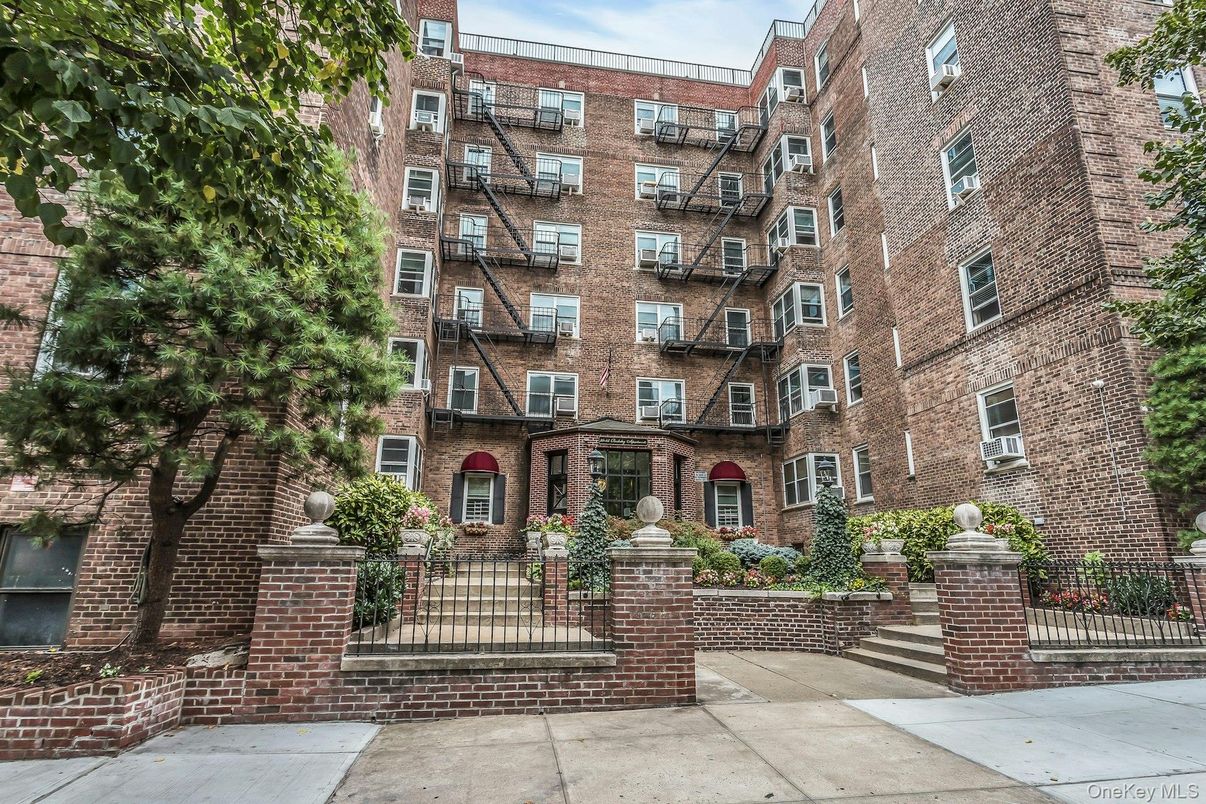 Exterior, Facade, Brick Facade, Condo Building