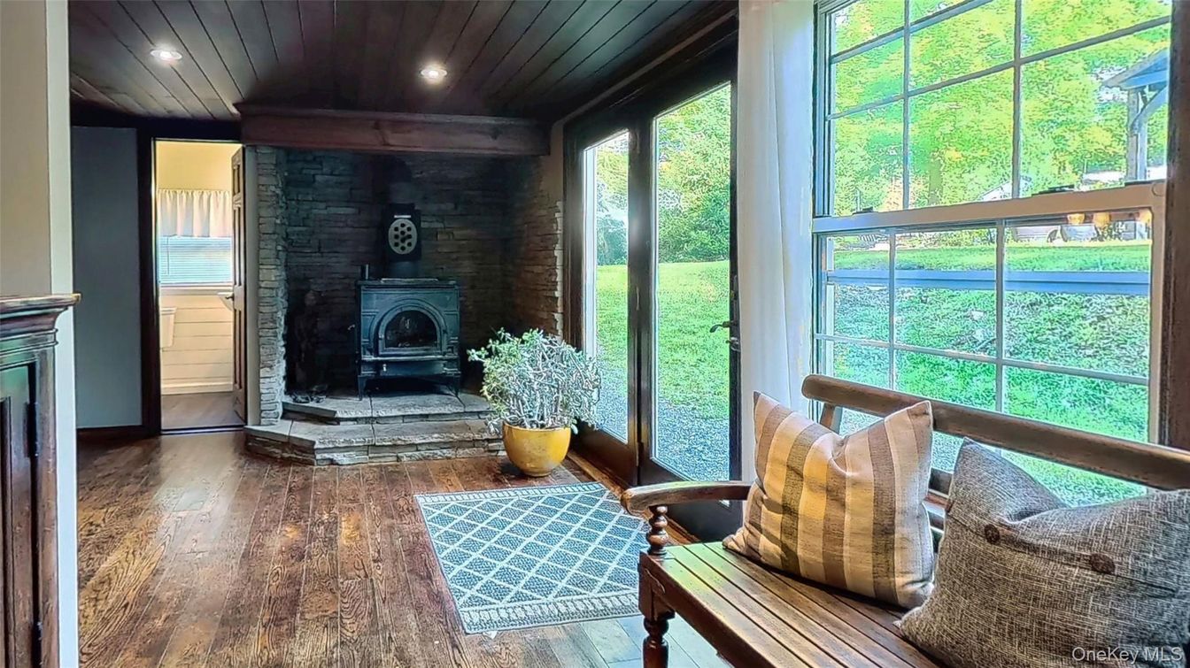 Fireplace, Interior, Recessed Lighting, Stone Walls, Wood Texture Flooring