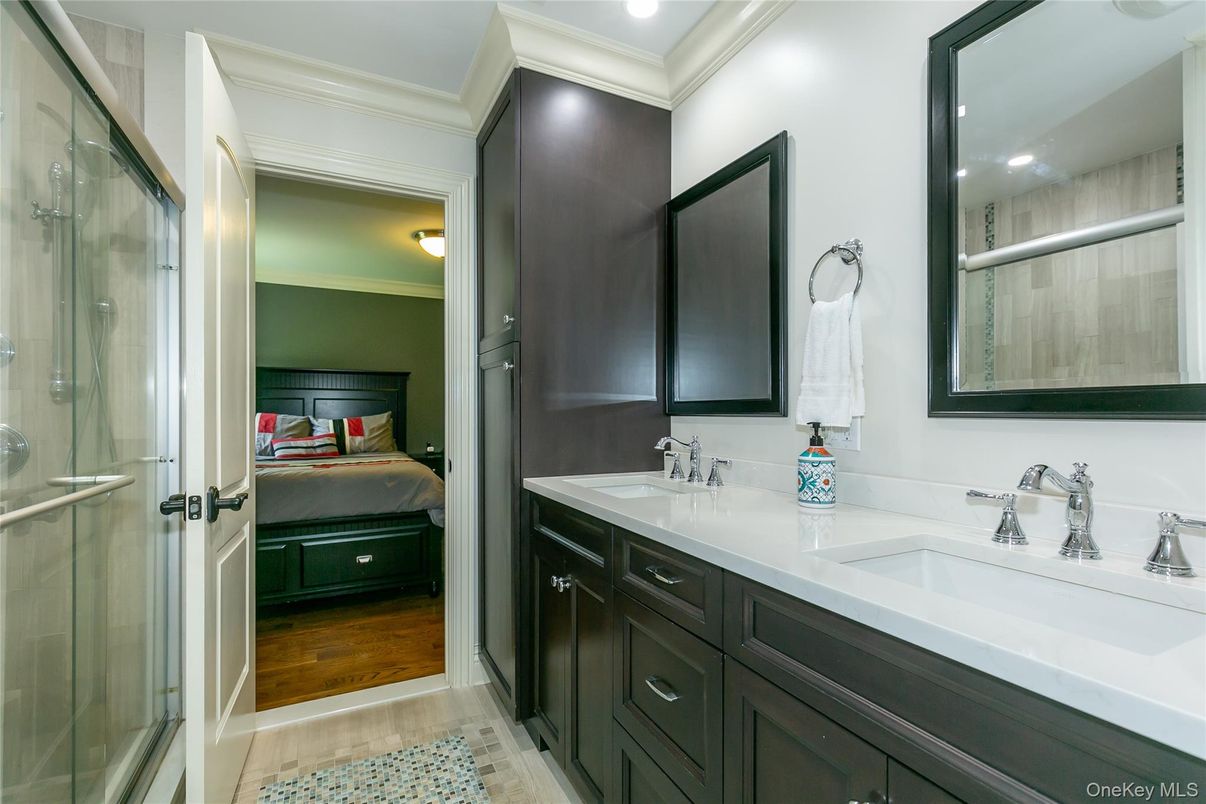 Bathroom, Bedroom, Dual Sink Vanities, Glass Shower, Interior, Recessed Lighting, Wood Texture Flooring