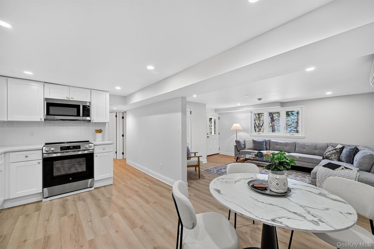 Dining room, Interior, Kitchen, Living room, Recessed Lighting, Stainless Steel Appliances, Wood Texture Flooring